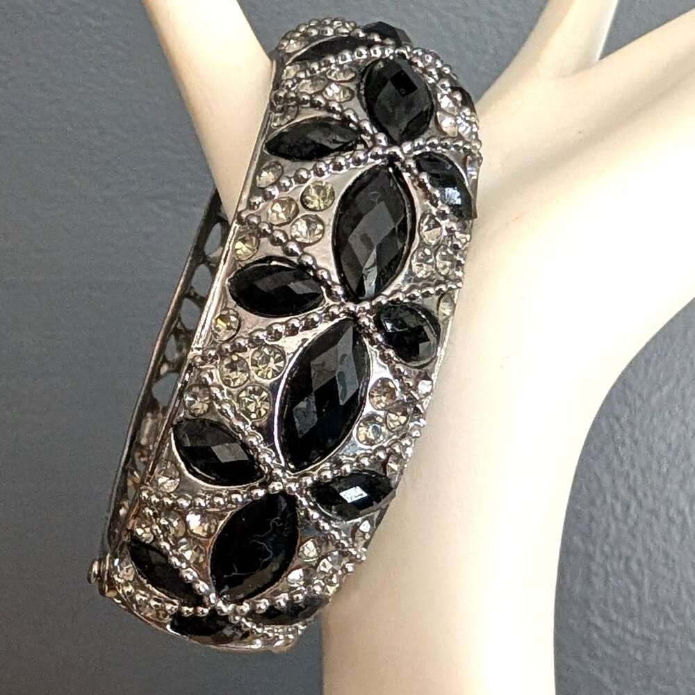 Gray metallic metal bracelet with black and clear bead accents
